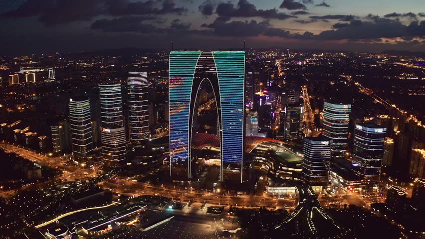 CBD buildings by Jinji Lake at night in Suzhou, China 4k