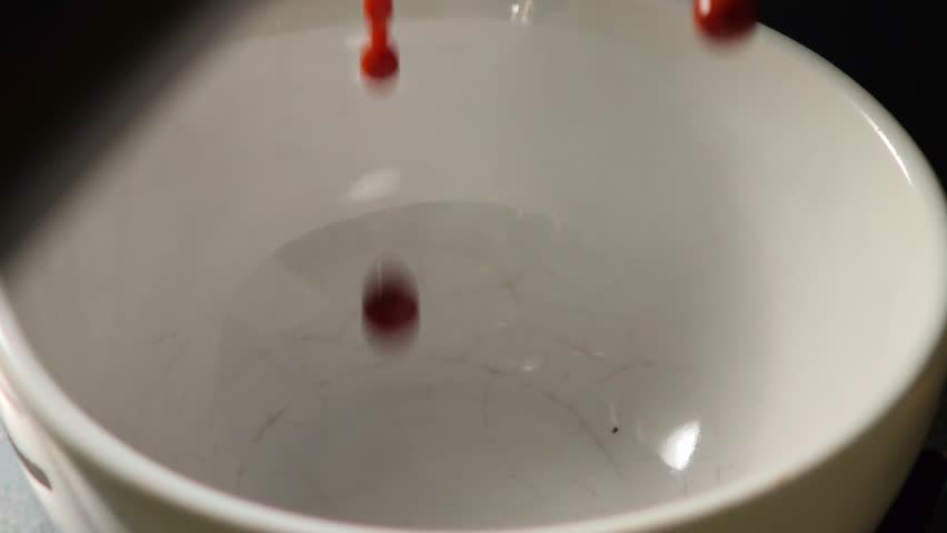 4K Pouring coffee stream from professional