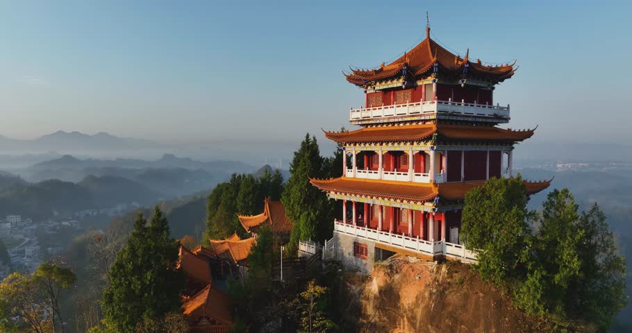 Sunrise and ancient chinese buddha temple landscape in Hunan province,China