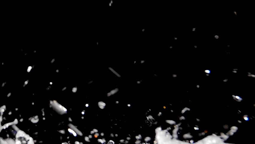 Dynamic water splash, perfect for showcasing freshness and movement against a dark background