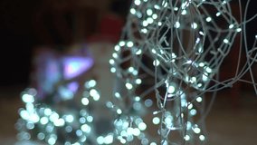 Cozy Christmas Snowman Decoration Surrounded by Festive Garlands Lights, Glowing Gift Boxes, and Warm Holiday Ambience in a Soft, Dreamy Winter Night Setting - Powered by Shutterstock - Get 15% off with code: PIKWIZARD15