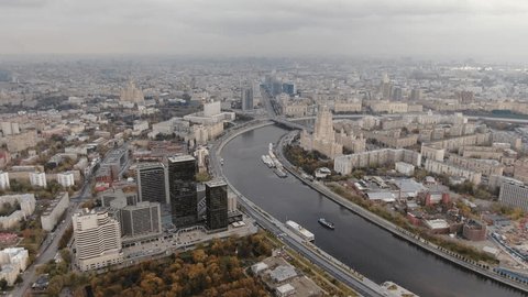 High Drone View River Bend Dense Cityscape