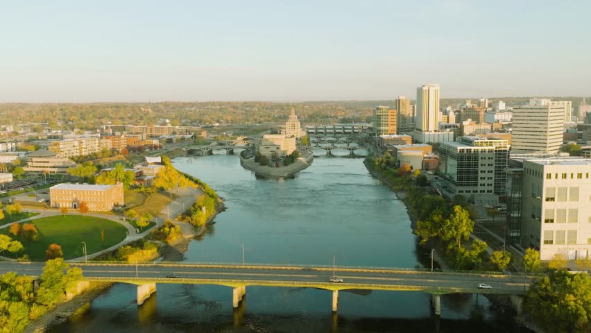 A beautiful sunrise drone push-in shot of the Veterans Memorial Building in Cedar Rapids, Iowa. Capturing warm morning light, historic architecture, and a powerful tribute to American veterans.
