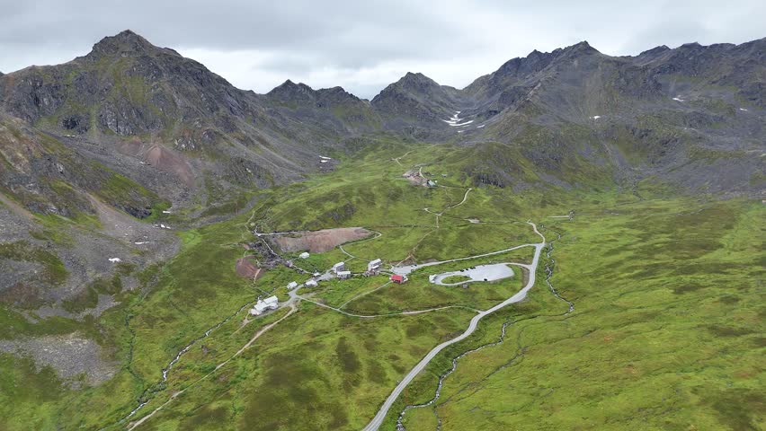 Drone soaring high over Independence Gold Mine near Hatcher Pass in Alaska