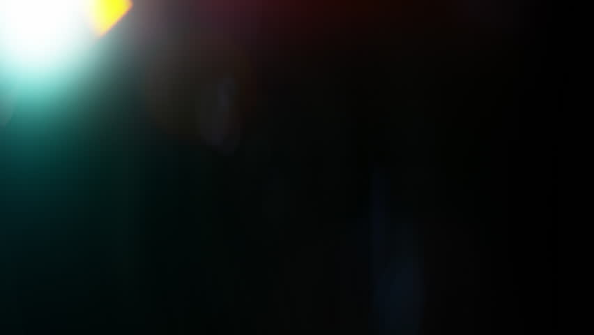 Real Shooted Cinematic Lens Flare Overlay on Black Background at 1000fps Slow Motion.
