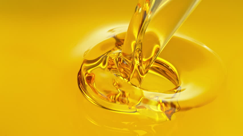 Super Slow Motion Shot of Pouring and Splashing Golden Oil Liquid at 1000fps.