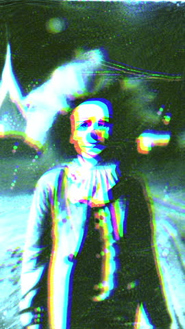 Glitch Art Portrait Of A Neon Blue Clown Mask With Distorted Facial Features And Surreal Glow Vertical Video
