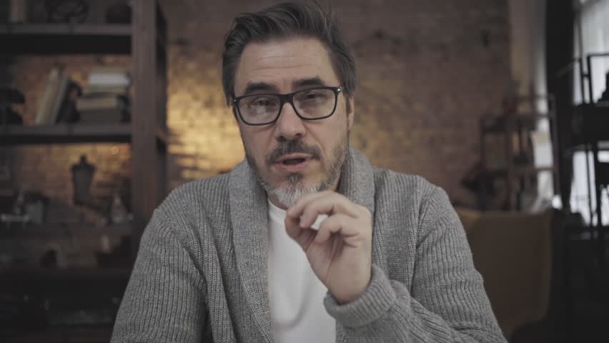 Teacher teaching online from home. Man talking on conference call. Tutor explaining in webinar. E learning online class, lesson, training course.