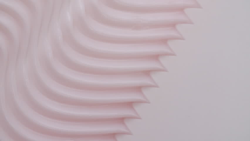 Pink skincare cosmetic cream texture footage. Moisturising waves cream texture motion with spatula. Body care light creamy beauty product smudge closeup. Sample for advertising cosmetic products
