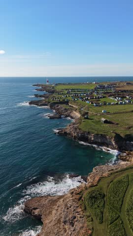 Aerial Drone View of Portland Bill Lighthouse and Coastal Cliffs, England
