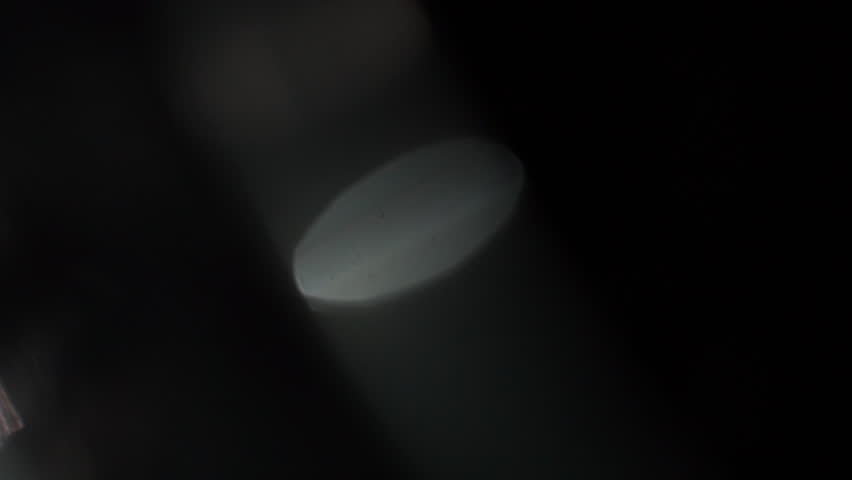 Clean optical lens inhale with a subtle white halo Cinematic Light Leak Overlay. Ideal for seamless cuts and high-definition video aesthetics.