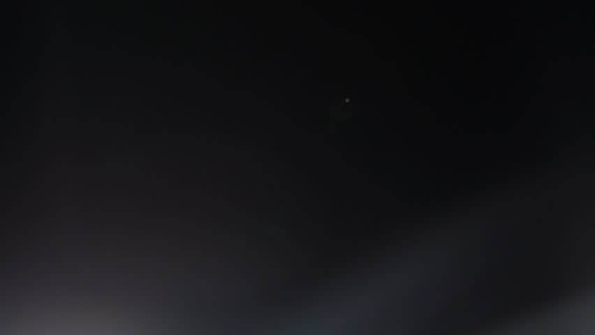 Cool white and brilliant optical lens flare Silver Light leak Overlay. Ideal for clean, high-tech, and futuristic video aesthetics.