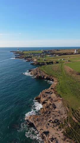 Aerial Drone View of Portland Bill Lighthouse and Coastal Cliffs, England