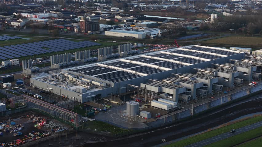 Aerial drone video footage of a hyperscaler data center facility in Winschoten, Groningen, focusing on Artificial Intelligence, computing power, infrastructure, and renewable energy resources.