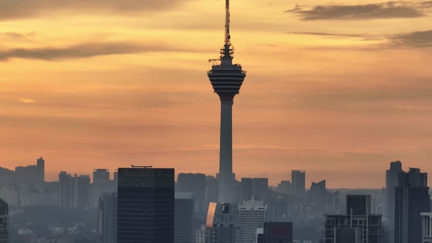 Sunset skyline view of KL Tower in Kuala Lumpur, Malaysia