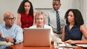 Diverse Business Team Shows Concern While Reviewing Data on Laptop During Boardroom Meeting - Powered by Shutterstock - Get 15% off with code: PIKWIZARD15