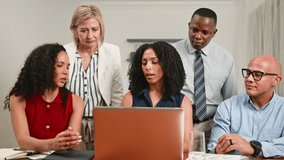 Diverse Business Team Collaborates on a Project During an Engaged Office Meeting with a Laptop - Powered by Shutterstock - Get 15% off with code: PIKWIZARD15
