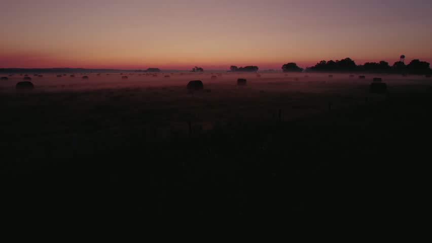 Foggy Twilight Hay Bales: Harvest Season in Rural Farmland | Peaceful Scene in Nebraska USA