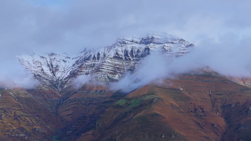 Aerial view from a drone of the winter landscape around the village of Vega de Pas in the Pasiegos Valleys. Cantabria. Spain. Europe