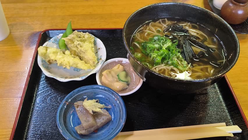 Closeup at set of Soba buckwheat noodles soup, fermented pickles Japanese food