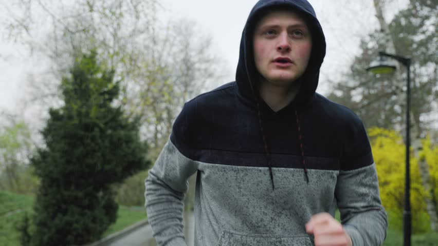 Gymnastic Excellence Hands-On Training for Success. An athlete performs a series of athletic exercises, striving for the perfect winning performance, with hands up in determination.
