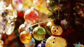 Beautiful glass Christmas ornaments shine at a cozy market beside a glowing igloo, creating a magical winter scene filled with festive lights, handcrafted décor, and enchanting holiday atmosphere. - Powered by Shutterstock - Get 15% off with code: PIKWIZARD15