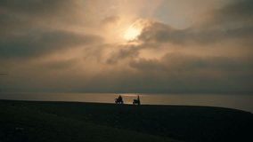 Biking at Sunset by the Ocean — Drone View of Man Cycling for Fitness and Adventure in Banswara, Rajasthan, India - Powered by Shutterstock - Get 15% off with code: PIKWIZARD15