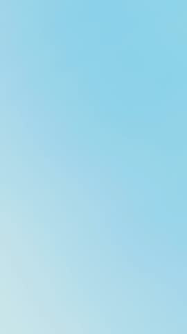 Card from below, against the sky, a horse jump, a thoroughbred beautiful brown stallion, a horse, with a girl rider, a jockey jumps over the barrier