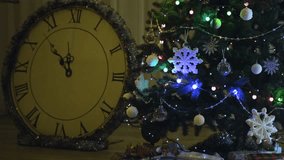 Christmas tree branches decorated at night with colorful ornaments, garlands, and blinking light reflections creating a cozy festive atmosphere. - Powered by Shutterstock - Get 15% off with code: PIKWIZARD15