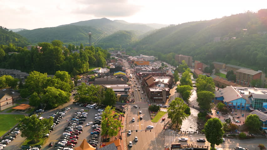 Gatlinburg, scenic mountain town in Tennessee with main Parkway full of restaurants, souvenir shops and entertainment venues in Appalachian region.