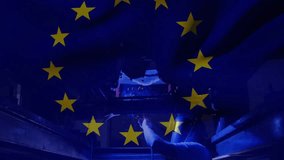 Auto mechanic activating grinder under car, fixing chassis, sparks flying, EU star overlay moving. Workshop, technician, welding, arc, metalwork, blue, lighting - Powered by Shutterstock - Get 15% off with code: PIKWIZARD15