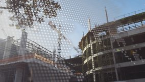 Digital overlay fading, revealing crane rotating and workers moving to show site progress. Construction, urban, scaffolding, tower, crew, highvisibility, safety - Powered by Shutterstock - Get 15% off with code: PIKWIZARD15