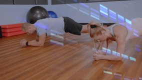 Two partners settling into elbow plank in gym, holding core while digital bars overlaying over them. Duo, fitness, training, workout, abs, balance, stability - Powered by Shutterstock - Get 15% off with code: PIKWIZARD15