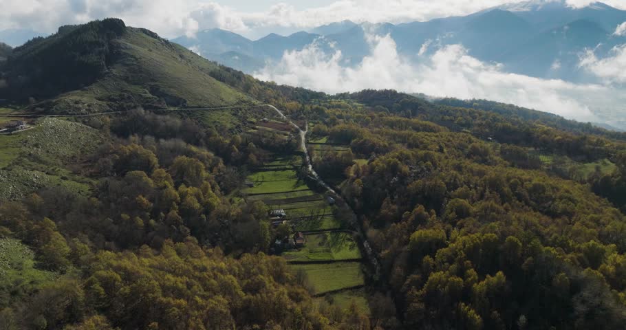 Aerial view of mountain and road, Italy.
