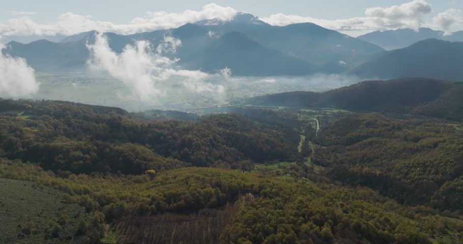 Aerial view of mountains and valley, Italy.