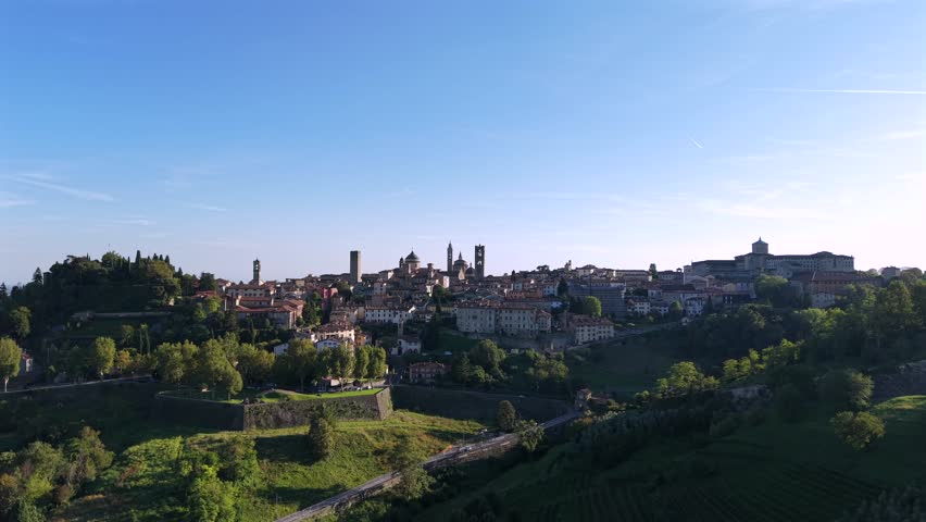 Historic Bergamo Città Alta in Lombardy, Italy. Drone video showing medieval cityscape, scenic views, and Italian architecture from above. 4K