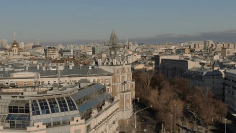 Smooth Ascending Drone Flight over Historic Rooftops