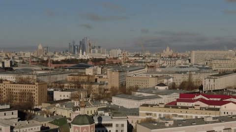 Smooth Side Travel Drone Shot over Dense Urban
