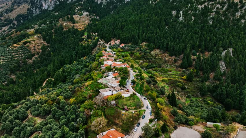 Aerial view of buildings on mountainside, Greece.