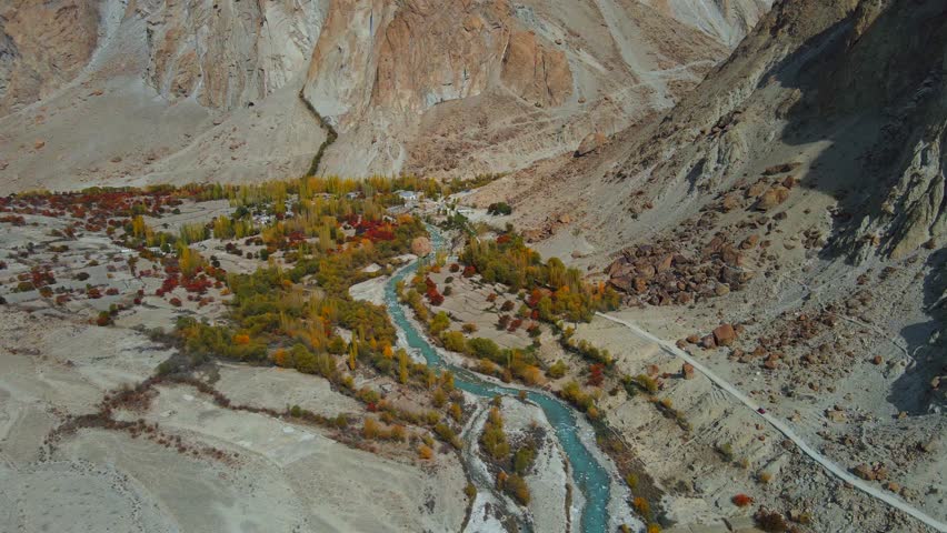Aerial view of Khorkondus village and river, Pakistan.