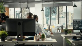 Diverse work team study analytics and forecasting to focus on performance metrics and report writing. Data visualization to support growth and management decisions in office. Camera B. - Powered by Shutterstock - Get 15% off with code: PIKWIZARD15