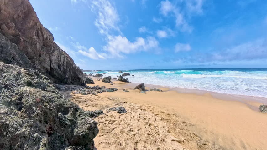 Panning over Blue Waves on Big Sur Coast in central California