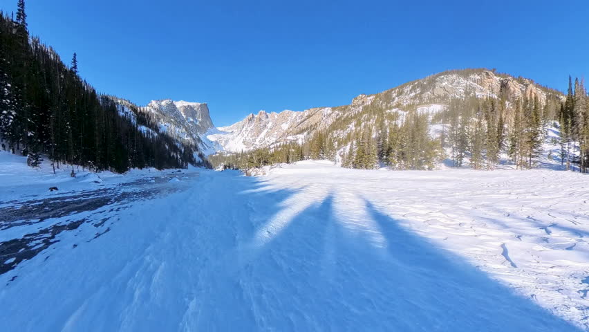 Walking Across Surface of Dream Lake in Rocky Mountain National Park