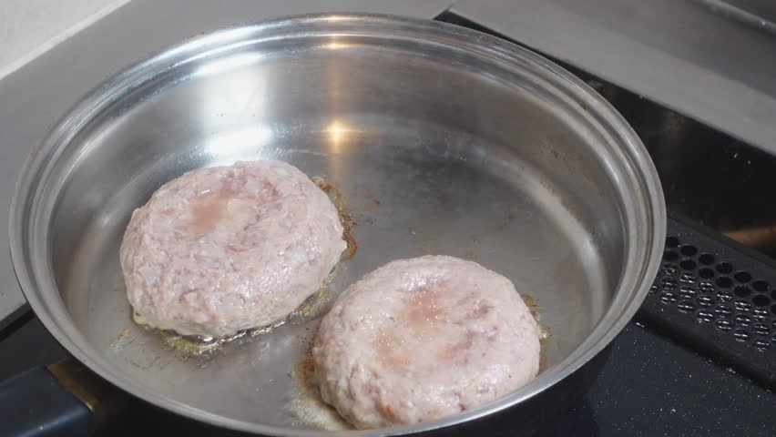 Japanese food hamburg steak.Cook in a frying pan and flip with a spatula.