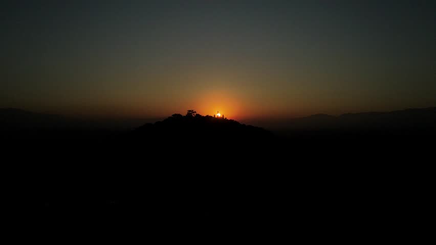 The aerial view shows a gloomy sunrise over the city of Kathmandu, Nepal.