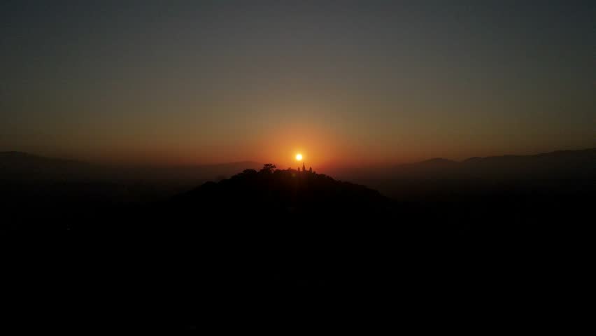 The aerial view shows a gloomy sunrise over the city of Kathmandu, Nepal.