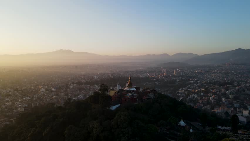 The aerial view shows a gloomy sunrise over the city of Kathmandu, Nepal.