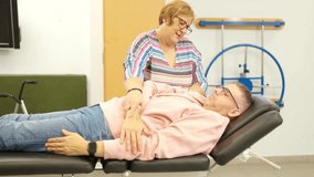 Physiotherapist working with a patient with physical disability during rehabilitation session - Powered by Shutterstock - Get 15% off with code: PIKWIZARD15