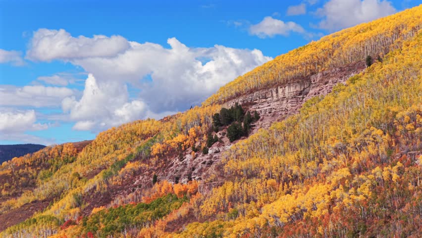 Vail Valley Vail Village Avon Beaver Creek Vail Pass aerial drone Colorado fall autumn Rocky Mountains hillside cliffs quaking Aspen Trees morning bluesky cliffs Piney Ranch Vail Ski resort Gore range