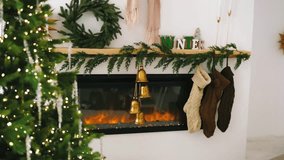 Cozy fireplace with glowing embers, decorated Christmas tree, and festive stockings hanging on mantel - Powered by Shutterstock - Get 15% off with code: PIKWIZARD15